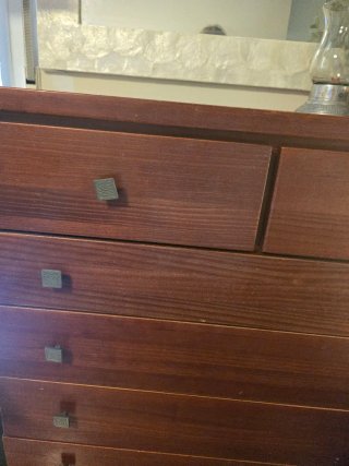 Cómoda 7 cajones madera color nogal