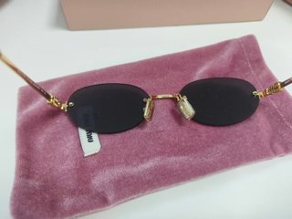 Gafas Miu Miu Cat-Eye Negro/Dorado