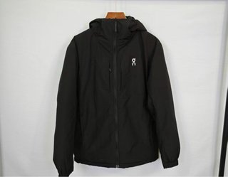 Chaqueta On verde y amarilla