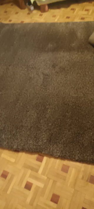 Alfombra beige y marrón de tela