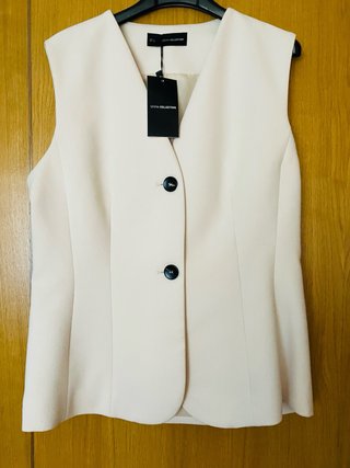 Chaleco Sfera Beige Talla L sin estrenar