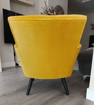 Sillón tapizado amarillo en perfecto estado