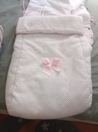 Saco silla paseo bebé blanco y rosa
