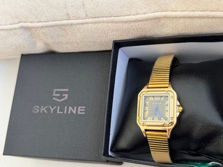 Reloj Skyline Dorado y Negro