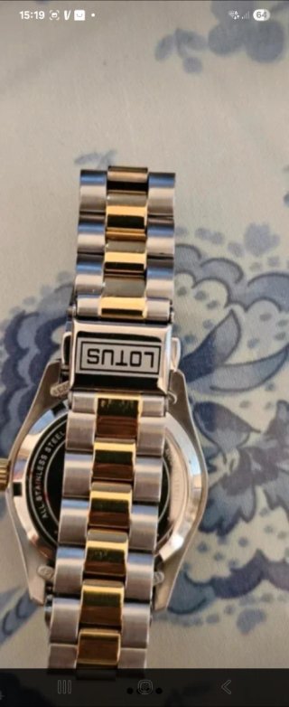 Reloj Lotus Oro y Plata Nuevo.  Medidas 32,5mm