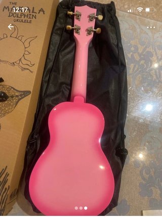 Ukelele Makala rosa sin usar