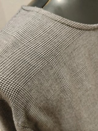 Blusa gris con lazada en mangas