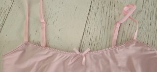 Canottiera rosa con fiocco