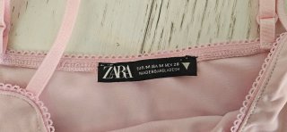 Canottiera rosa con fiocco