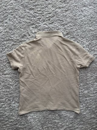 Polo beige con cremallera