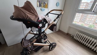 Carrito de bebé marrón y beige