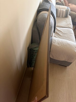 Espejo de madera marrón