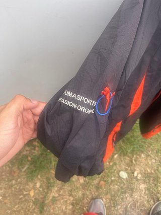 Chaqueta Puma Negra y Naranja