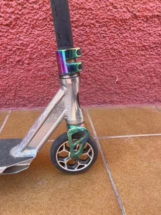 Monopatín freestyle plateado