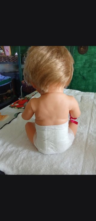 Muñeco con carro.