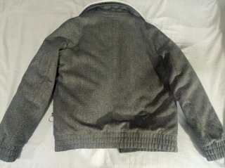 Chaqueta gris Inditex con cuello de borrego