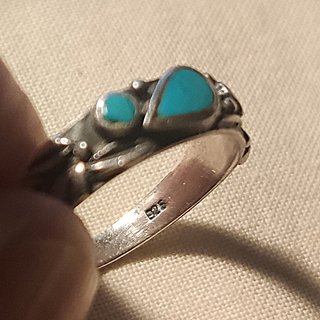 ANILLO DE PLATA CON PIEDRAS TURQUESAS