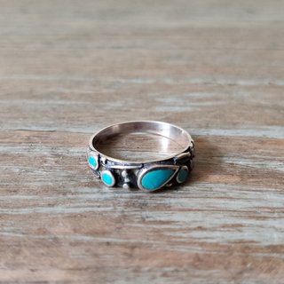 ANILLO DE PLATA CON PIEDRAS TURQUESAS