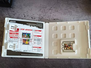 Super Smash Bros. 3DS con caja y guía