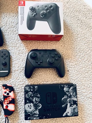 Nintendo Switch + Juegos y Accesorios