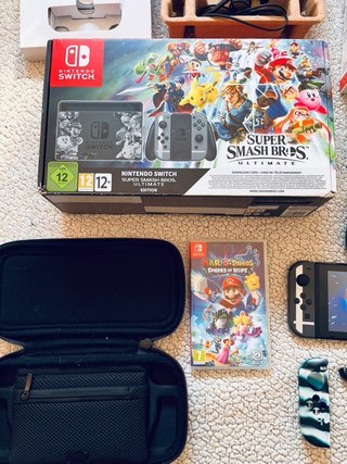 Nintendo Switch + Juegos y Accesorios