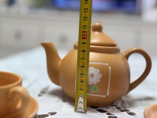 Juego de tetera y tazas de cerámica