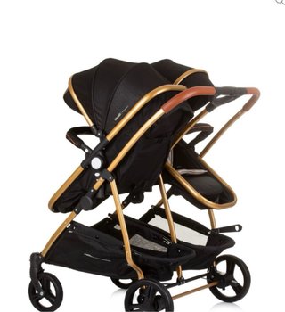 Carrito gemelar negro y dorado
