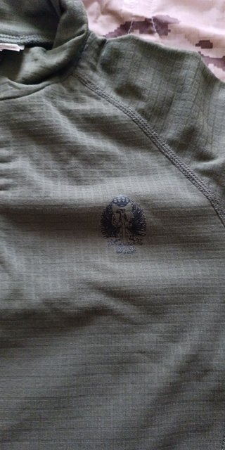 Camiseta térmica verde con cremallera talla S