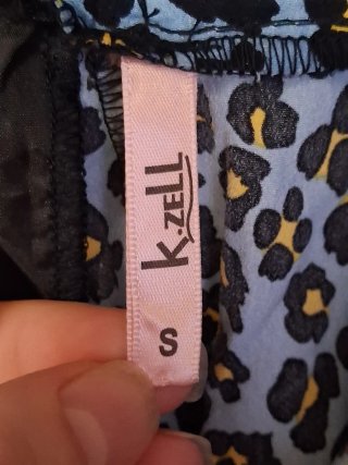 Pantaloni donna fantasia leopardata