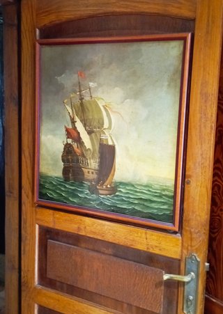 Pintura al óleo de barco en el mar