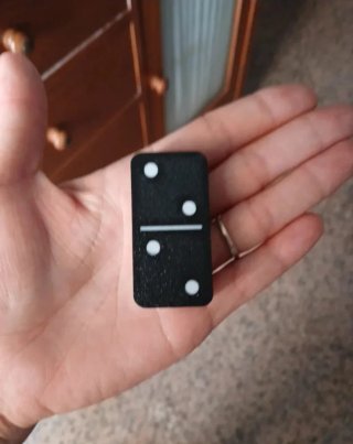 Juego de dominó negro