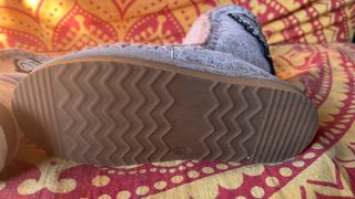 Botas plateadas con adornos de alas tipo Mou