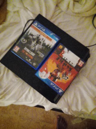 Consola PS4 + 2 Juegos