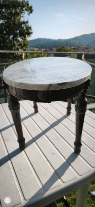Mesa de centro ovalada mármol y madera