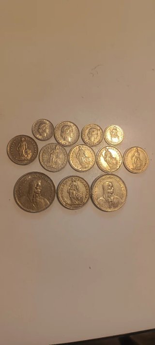 12 Monedas Franco Suizo