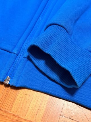 Sudadera Puma cremallera azul y negra