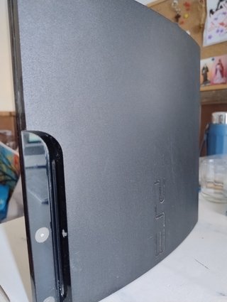 PS3 Slim + 3 mandos + 5 juegos