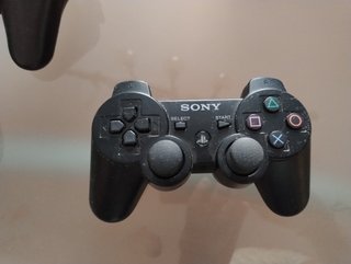 PS3 Slim + 3 mandos + 5 juegos