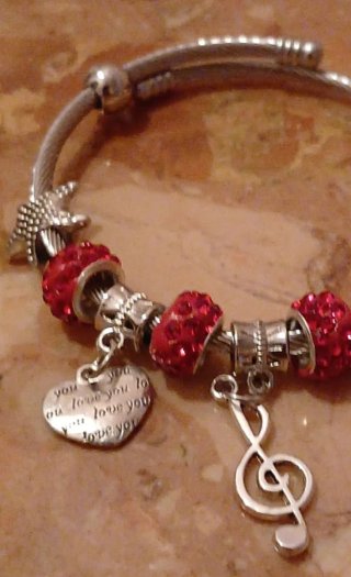 Bracciale rigido donna argento con charm e perline
