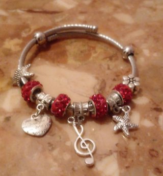 Bracciale rigido donna argento con charm e perline