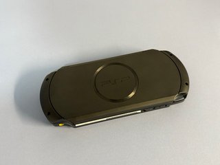 PSP Street E1004 + juegos + accesorios + caja