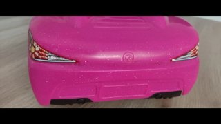 Coche Barbie Rosa con Barbie y Kent