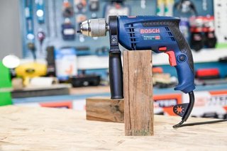 Taladro percutor 600W Bosch con maletín
