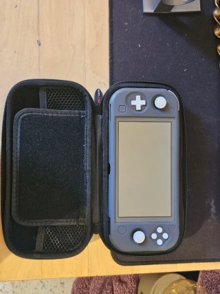 Nintendo Switch Lite con scatola e caricatore