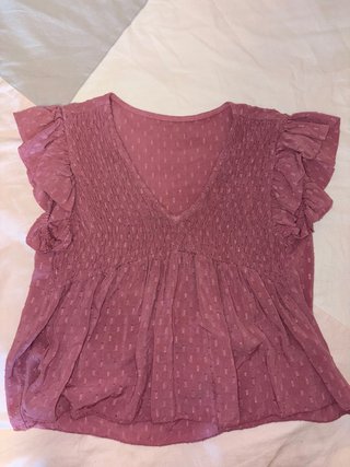 Blusa rosa con volantes