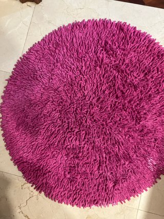 Alfombra redonda rosa de tela