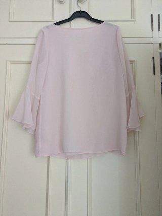 Blusa rosa manga acampanada
