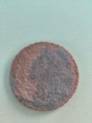 Moneda antigua española de 8 maravedís de 1788.