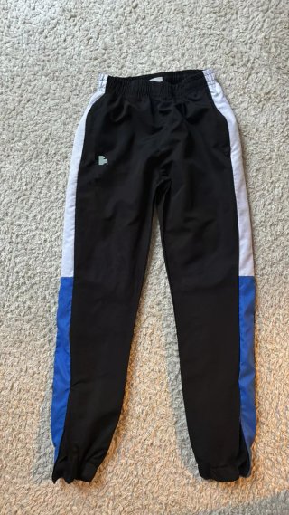 Tuta sportiva Lacoste uomo nera e blu