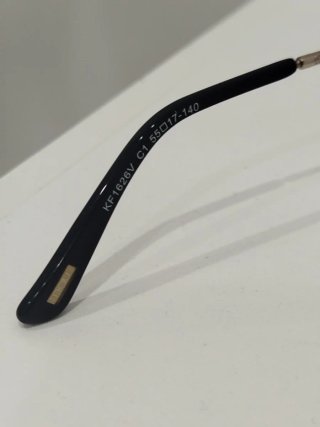 Montura de gafas negras y grises